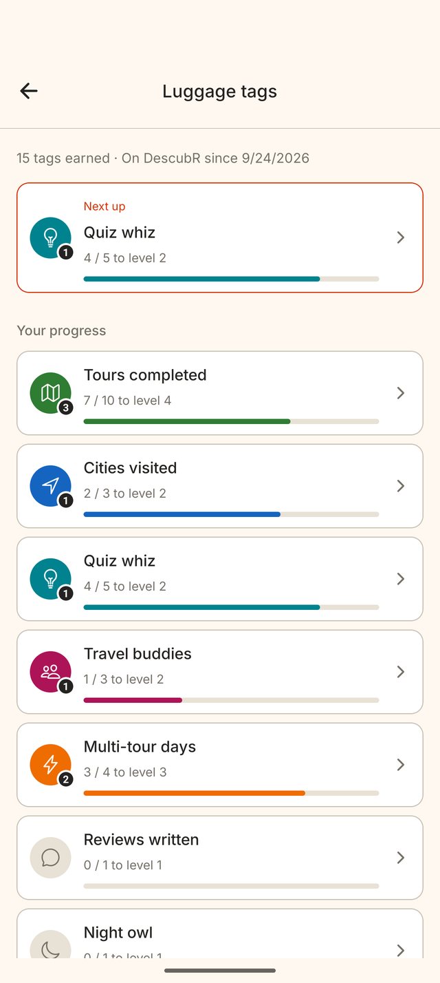 DescubR Luggage tags screen with progress on tours completed, cities visited and quizzes