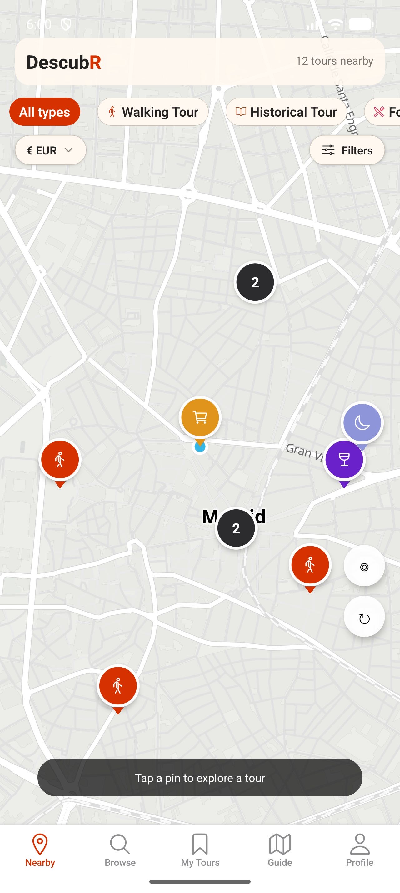 DescubR nearby map showing self-guided tour pins around Madrid